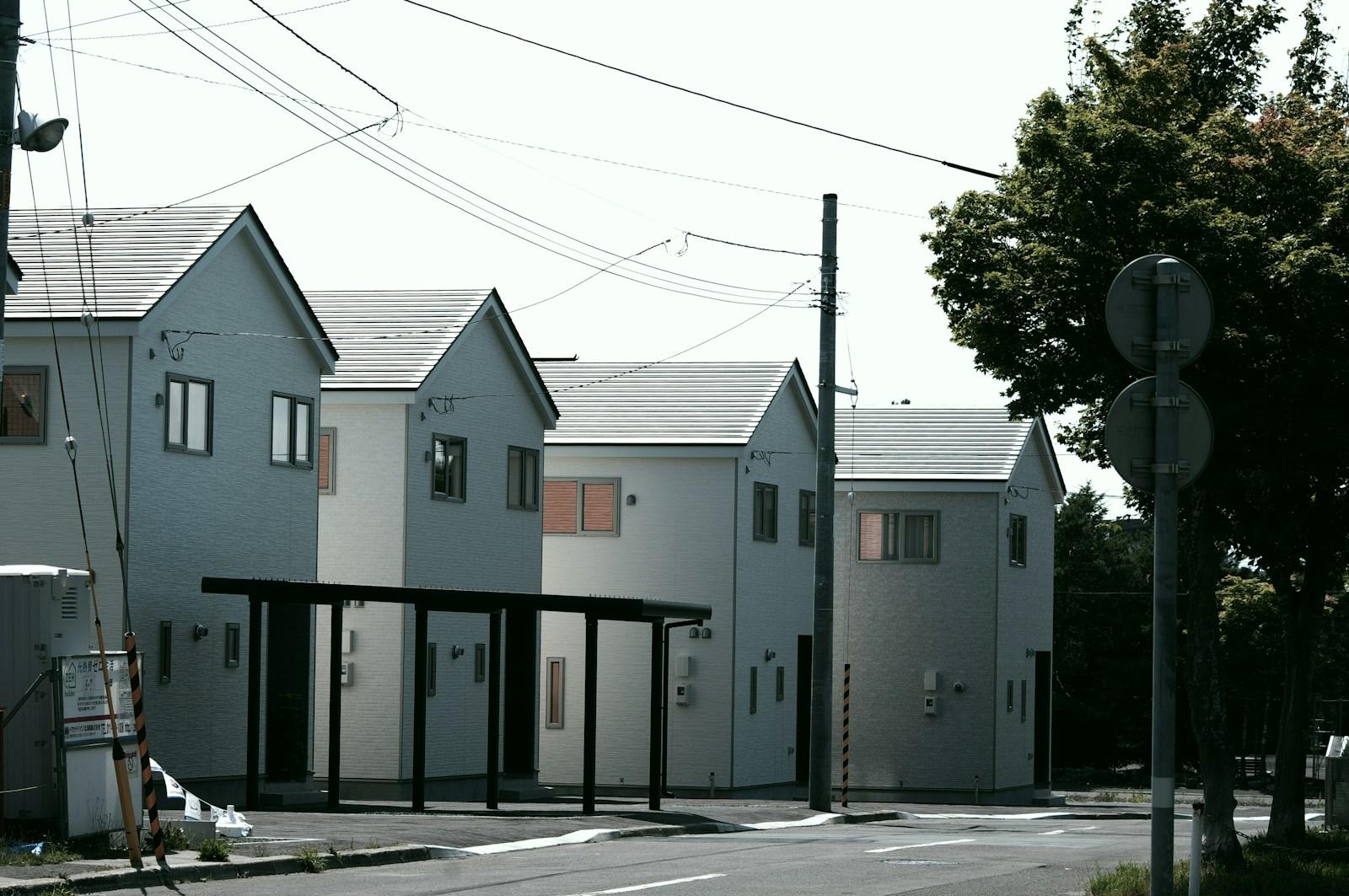 white and gray concrete house